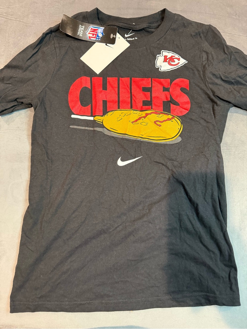 Nike Black Chiefs Graphic Tee with Red and Yellow Logo and White Swoosh